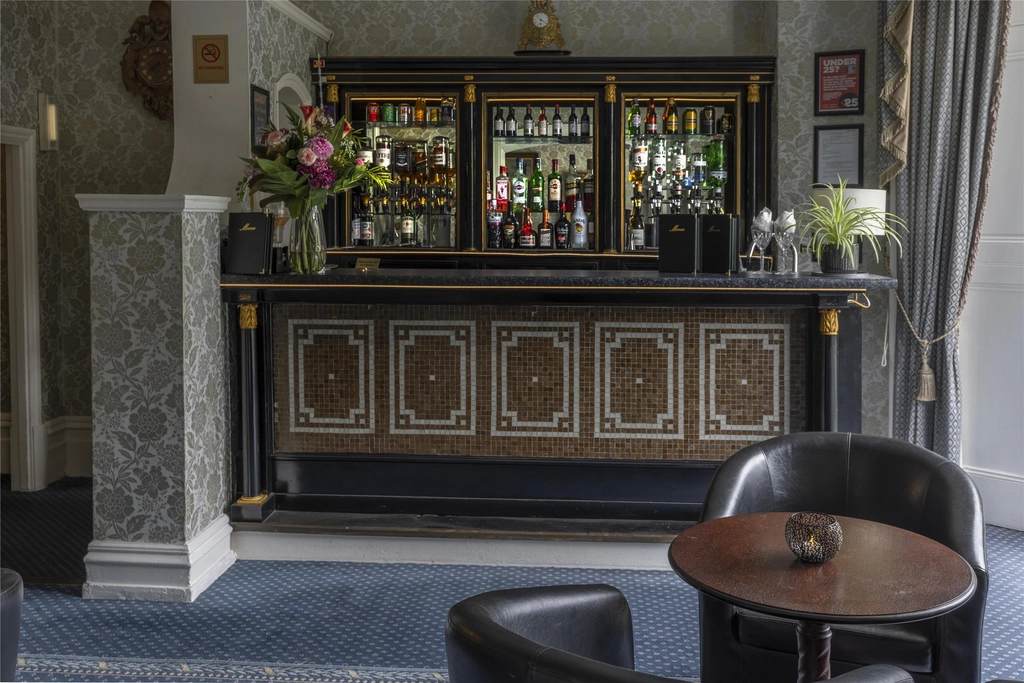Relax with a drink in Swiss Cottage's lounge bar