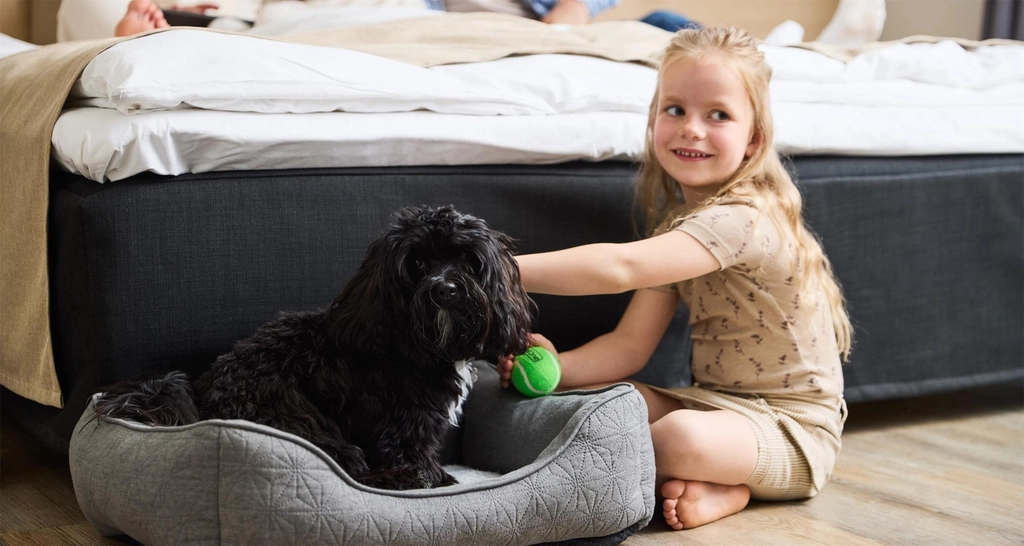 KId with dog
